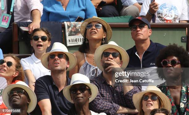 Woody Harrelson, his wife Laura Louie and their daughter Makani Harrelson attend the women's final during Day 14 of the 2018 French Open at Roland...