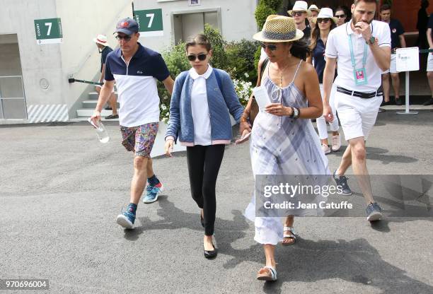 Woody Harrelson, his wife Laura Louie and their daughter Makani Harrelson attend the women's final during Day 14 of the 2018 French Open at Roland...