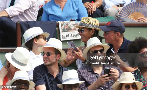 Woody Harrelson, his wife Laura Louie and their daughter Makani Harrelson attend the women's final during Day 14 of the 2018 French Open at Roland...