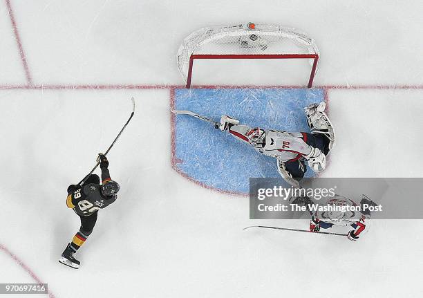 Washington Capitals goaltender Braden Holtby makes a save against Vegas Golden Knights right wing Alex Tuch late in the third period of Game 2 of the...