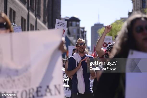 Protesters chanting slogans during a rally to protest the G7 summit in Quebec City, Canada on 9 June 2018. During the last day of the G7 summit that...