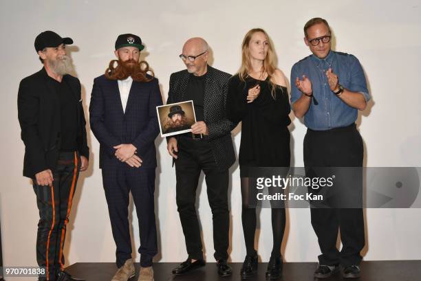 Model/actor Philippe Dumas;Model/actor Garey Faulkner, Hair and beard stylist Michel Dervy, journalists Marine Boisset from Public Magazine and...