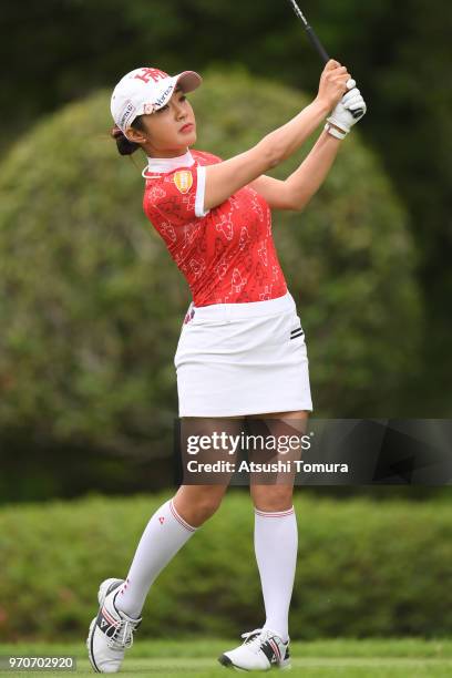Bo-Mee Lee of South Korea hits her tee shot on the 11th hole during the final round of the Suntory Ladies Open Golf Tournament at the Rokko Kokusai...