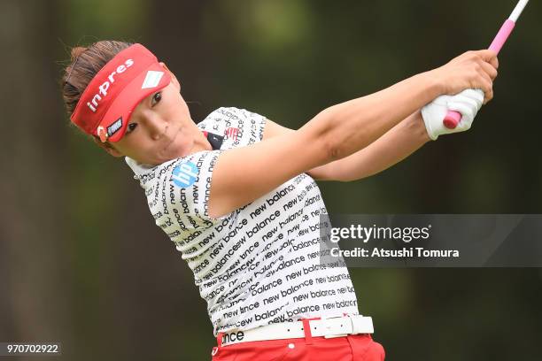 Chie Arimura of Japan hits her tee shot on the 2nd hole during the final round of the Suntory Ladies Open Golf Tournament at the Rokko Kokusai Golf...