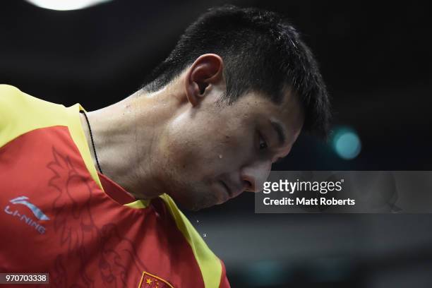Jike Zhang of China looks dejected against Tomokazu Harimoto of Japan during the men's final on day three of the ITTF World Tour LION Japan Open...