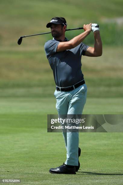 Lee Slattery of England plays his second shot of the 1st hole during day four of The 2018 Shot Clock Masters at Diamond Country Club on June 10, 2018...