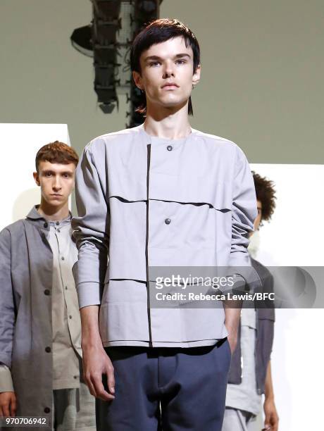 Model poses at the Phoebe English Presentation during London Fashion Week Men's June 2018 at BFC Show Space on June 10, 2018 in London, England.