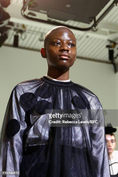 Model poses at the Phoebe English Presentation during London Fashion Week Men's June 2018 at BFC Show Space on June 10, 2018 in London, England.