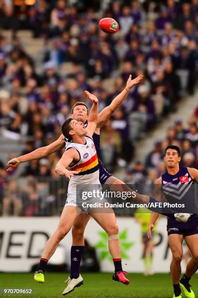 Scott Jones of the Dockers contests a ruck with Josh Jenkins of the Crows during the 2018 AFL round 12 match between the Fremantle Dockers and the...