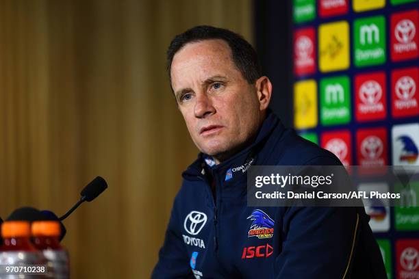 Don Pyke, coach of the Crows takes questions at the post game press conference during the 2018 AFL round 12 match between the Fremantle Dockers and...