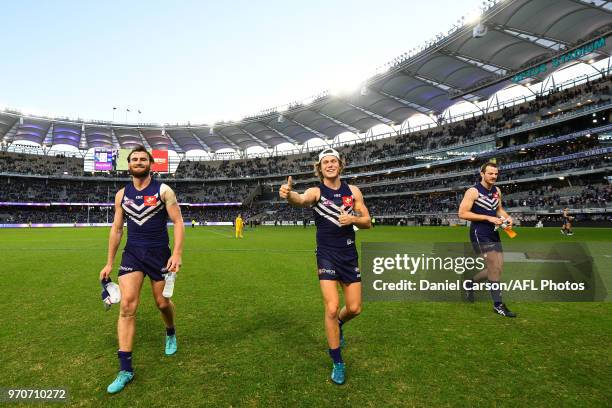 Connor Blakely and Ed Langdon of the Dockers celebrate the win during the 2018 AFL round 12 match between the Fremantle Dockers and the Adelaide...