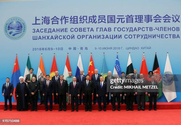 Russian President Vladimir Putin during a photo session of the SCO Heads of State, heads of observer nations and leaders of international...