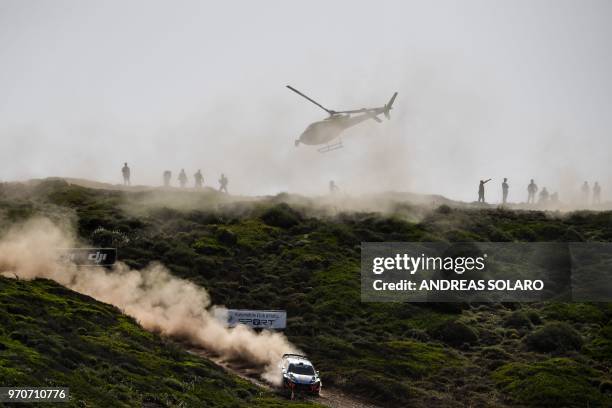 Belgium's driver Thierry Neuville and compatriot co-driver Nicolas Gilsoul steer their Hyundai i20 Coupe WRC during the 2018 FIA World Rally...