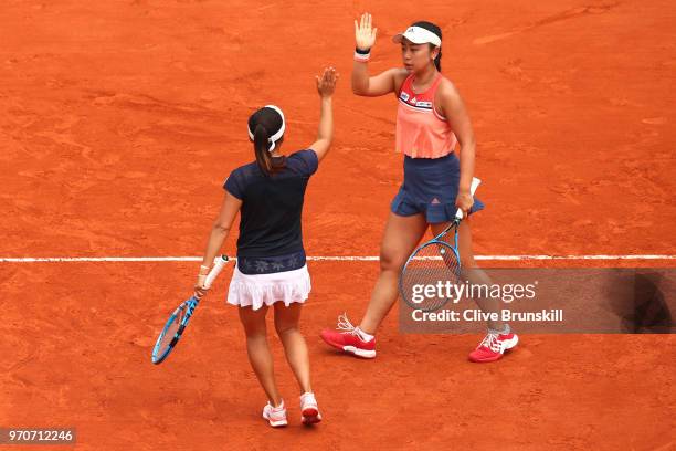 Eri Hozumi and Makoto Ninomiya of Japan celebrate during the ladies doubles final against Barbora Krejcikova and Katerina Siniakova of the Czech...