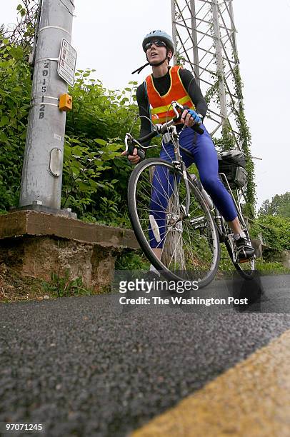 Tracy A. Woodward/The Washington Post W&OD trail just off Gallows Rd and the Dunn Loring/Merrifield Metro Station. Bicycle commuters on the W&OD...