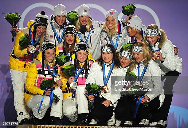 Team Germany receives the silver medal, Team Norway receives the gold medal and Team Finland receives the bronze medal during the medal ceremony for...