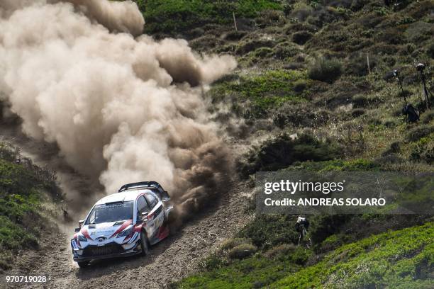 Finland's driver Jari-Matti Latvala and co-driver Miikka Anttila steer their Toyota Yaris WR during the 2018 FIA World Rally Championship on June 10,...