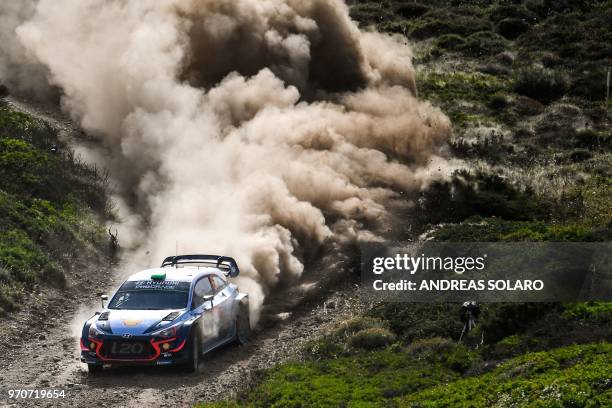 New Zealand's Hayden Paddon and co-driver Britain's Sebastian Marshall steer their Hyundai N i20 Coupe WRC during the 2018 FIA World Rally...