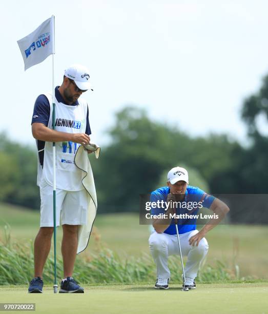 David Horsey of England lines up a putt on the 4th green during day four of The 2018 Shot Clock Masters at Diamond Country Club on June 10, 2018 in...