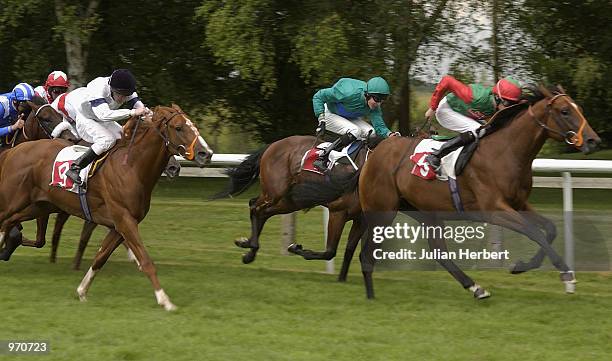 July 10: Richard Hughes brings Mister Links home to land The TNT July Stakes run at Newmarket Racecourse in Newmarket on July 10, 2002.