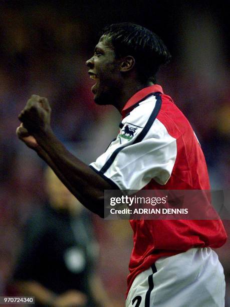 Arsenal's Lauren Bisan-Etame celebrates to the crowd after scoring the first goal against Liverpool during their premiership match at Highbury...