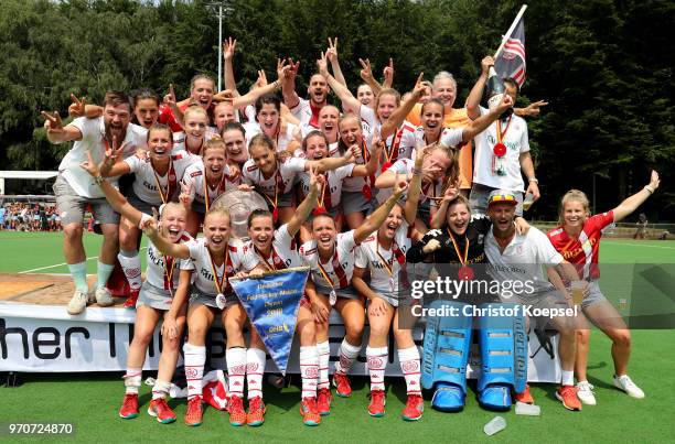 The team of der Club an der Alster Hamburg celebrates winning the German Championships after winning 3-1 the ladies final match between Club an der...