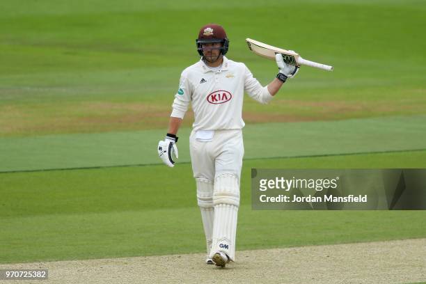 Rory Burns of Surrey celebrates his 150 during the Specsavers County Championship Division One match between Hampshire and Surrey at Ageas Bowl on...