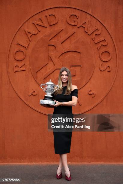 Ladies singles winner, Simona Halep of Romania poses with the Suzanne Lenglen trophy during day fifteen of the 2018 French Open at Roland Garros on...