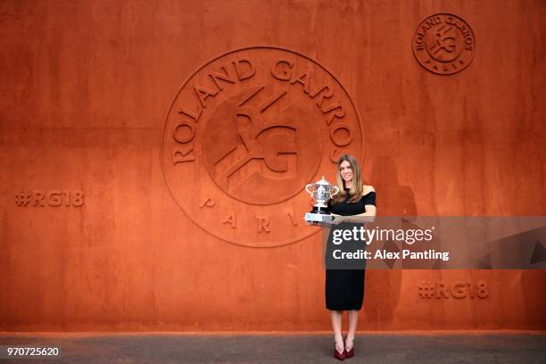 Ladies singles winner, Simona Halep of Romania poses with the Suzanne Lenglen trophy during day fifteen of the 2018 French Open at Roland Garros on...