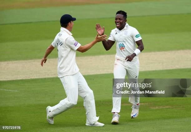 Fidel Edwards of Hampshire celebrates dismissing Ben Foakes of Surrey during the Specsavers County Championship Division One match between Hampshire...