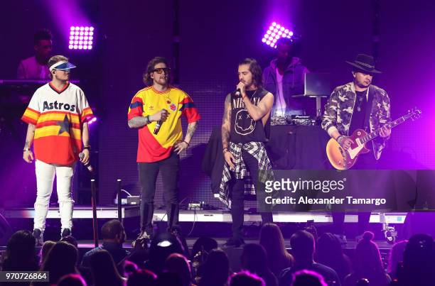 Piso 21 are seen performing during the Mix Live! presented by Uforia concert at the AmericanAirlines Arena on June 9, 2018 in Miami, Florida.