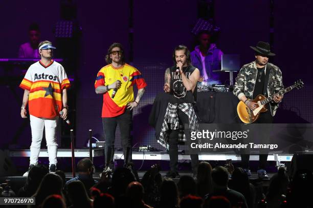 Piso 21 are seen performing during the Mix Live! presented by Uforia concert at the AmericanAirlines Arena on June 9, 2018 in Miami, Florida.
