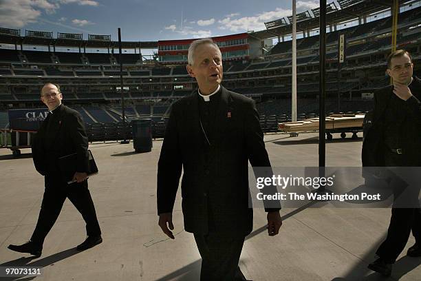 Archbishop of Washington Donald W. Wuerl tours the ballpark as preparation for Thursday's Papal Mass transforms the Nationals Baseball Stadium in...