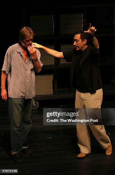 Washington, DC Graeme Malcolm , left, is directed by Moises Kaufman, playwright during rehearsal of a scene for the world premiere of "33...