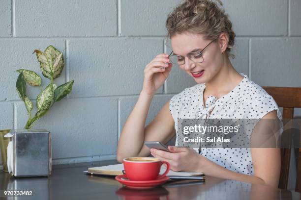young business woman in cafe - laughing sal stock pictures, royalty-free photos & images