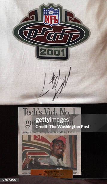 August 16, 2007 CREDIT: Carol Guzy/ The Washington Post Baltimore MD James Boddie poses for a portrait at his home holding a framed signed jersey of...