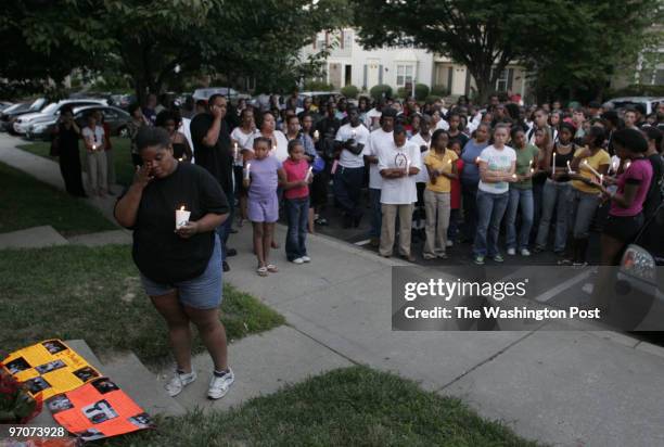 Double2 DATE: July 31, 2007 CREDIT: Carol Guzy/ The Washington Post Silver Spring MD Candlelight vigil for Herring brothers Jeremy, 18 and Justin, 20...