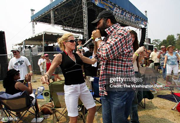 August 03, 2007 CREDIT: Mark Gail/ TWP Annapolis, Md. ASSIGNMENT#: 193084 EDITED: mg Eileen Gaffney danced to the harmonica music of Otis Taylor as...