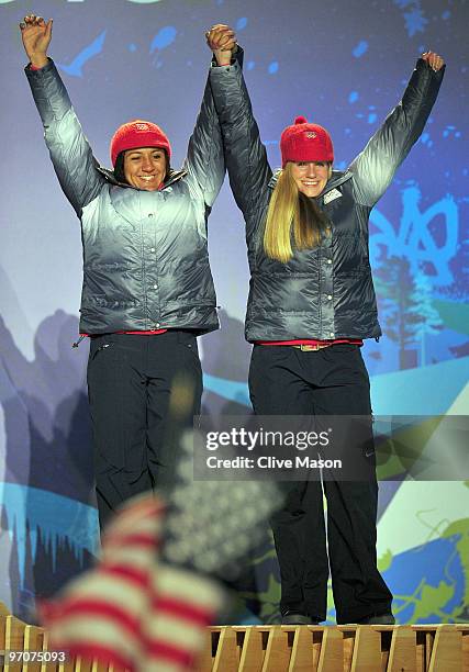 Elana Meyers and Erin Pac of the United States celebrate receiving the bronze medal during the medal ceremony for the women's bobsleigh on day 14 of...