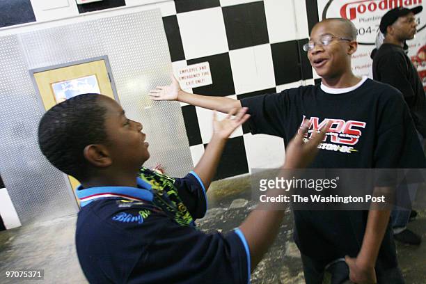 Tracy A. Woodward/The Washington Post G-Force Karts, 4245 Caroliona Ave., Richmond, VA Urban Youth Racing School Two friends have just come off the...