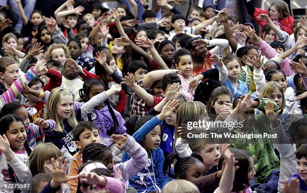 Feb. 29, 2008 CREDIT: Mark Gail/TWP Columbia, Md. ASSIGNMENT#: 198549 EDITED BY: mg Longfellow elementary school students waved their hands in the...