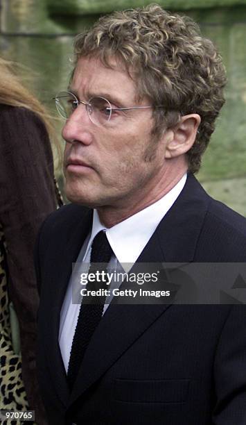 Rock singer Roger Daltre arrives for his funeral service at St. Edwards Church July 10, 2002 in Stow-on-the-Wold, United Kingdom. Entwistle, bass...