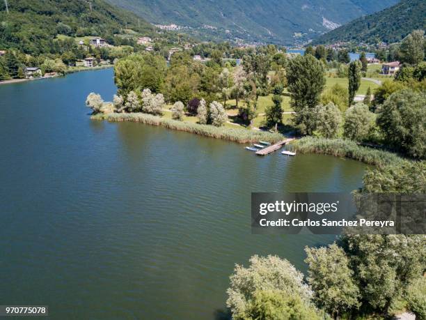 panoramic view of the lake - monasterolo del castello stock pictures, royalty-free photos & images