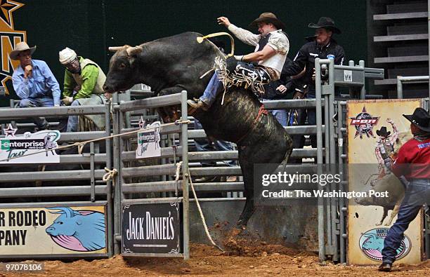 Professional bull riders come to this region as part of their PBR Challenger tour. Pictured, Clovis Crane, of Lebanon, PA, holds on tight to...