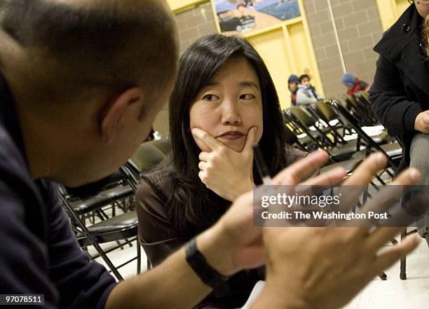 Schools Date: Kevin Clark/TWP Neg #: 196531 Washington, DC Cesar Espejo talks with Michelle Rhee, DC School Chancellor, Monday night during the town...