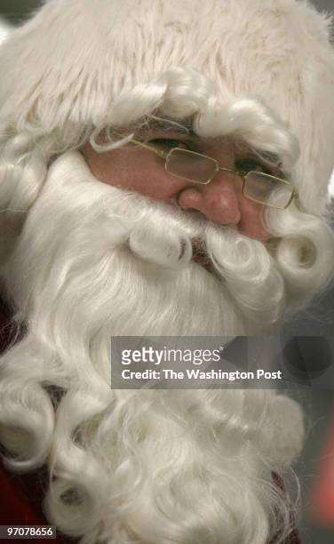 Carl Johnson, plays the role of Santa Claus at a holiday pancake breakfast community event at Calvary Lutheran Church in Silver Spring, Maryland, on...