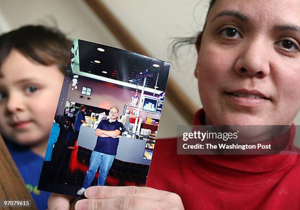 Tracy A. Woodward/The Washington Post Amaryllis Ave, Manassas, VA A Manassas mother coping with the tragic death of her husband. Donna Bland holds a...