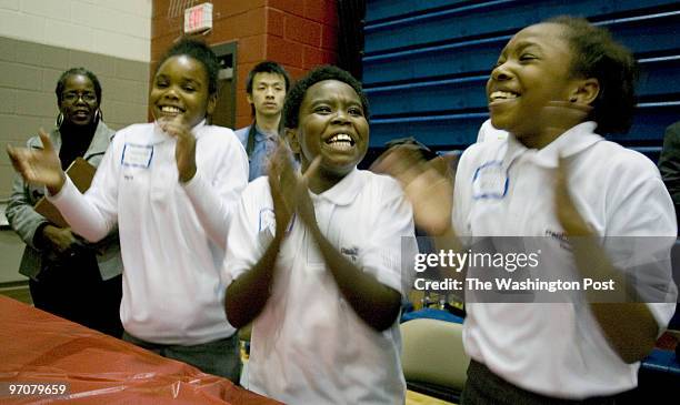 Plunge6 Date: Kevin Clark/TWP Neg #: 196251 Washington, DC Tierra Sales , Andre Ervin and Naiya Brooks of J.O. Wilson rejoice after winning the...