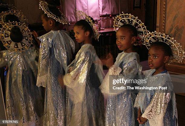 King St., Alexandria, Virginia Pictured from left to right snow angels Alexis McKelphin, Symone Brooks, Sajelle Avery and Ariana Jackson, prepare to...