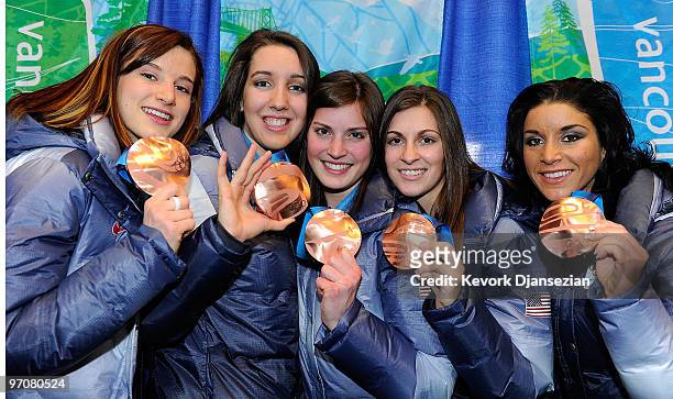 Team USA celebrates receiving the bronze medal during the medal ceremony for the ladies' 3000 m relay short track on day 14 of the Vancouver 2010...